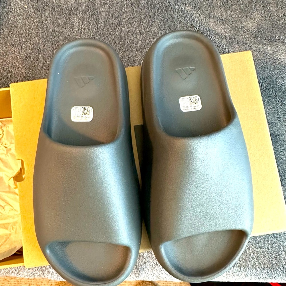 Brand new Yeezy slides. Purchased for my son. Size 11 but fit more like 10